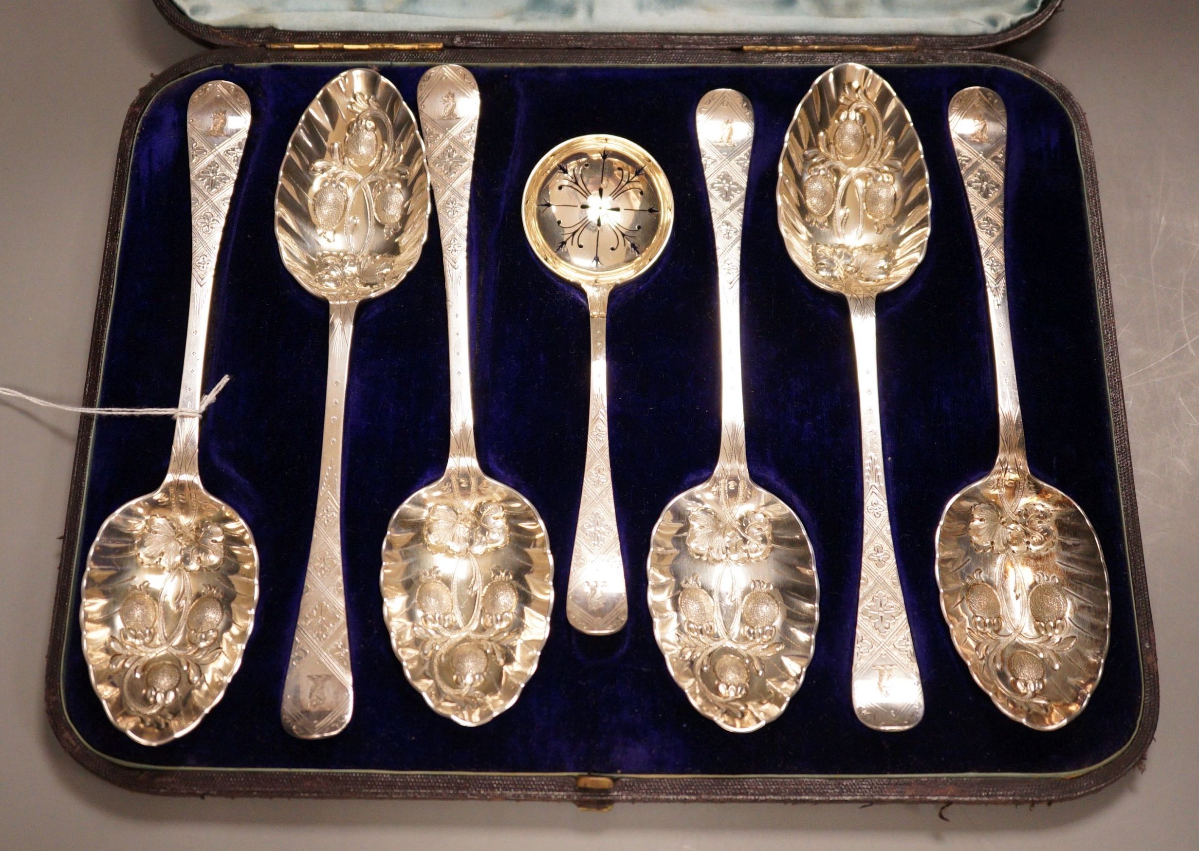 A cased set of Mappin & Webb plated berry spoons